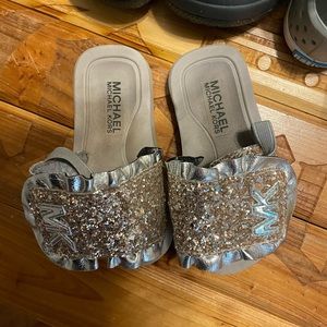 Michael Kors toddler flip flops with strap on the back